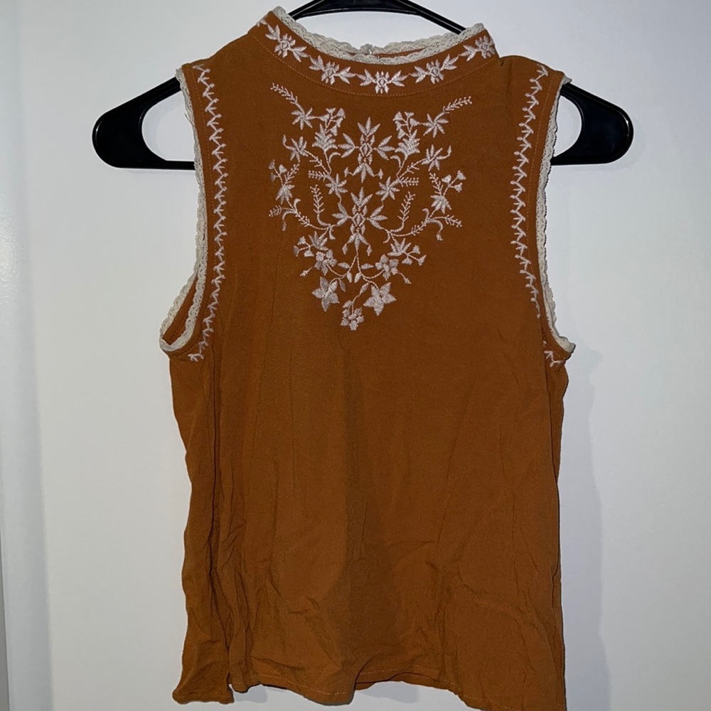 Mustard colored sleeveless blouse. US size small